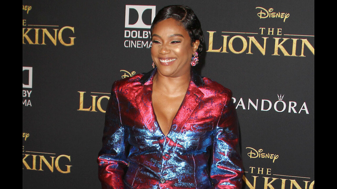 Tiffany Haddish taking romance advice from a fan who wrote her top tips in a letter