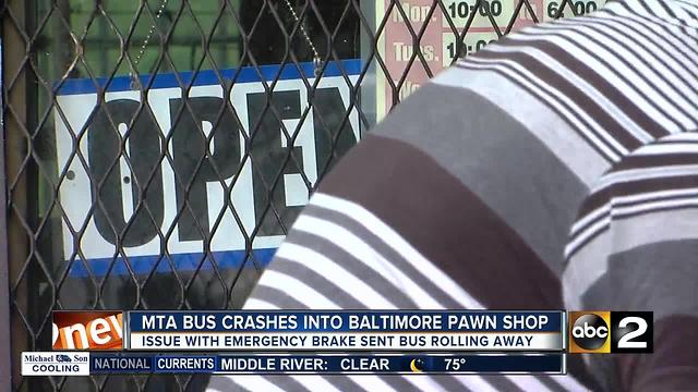 MTA bus hits pawnshop in NW Baltimore