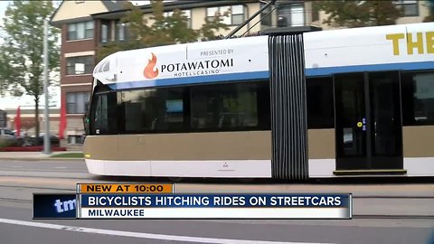 Streetcar operators see bicyclists hitching a ride on The Hop