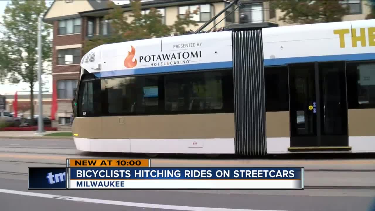 Streetcar operators see bicyclists hitching a ride on The Hop