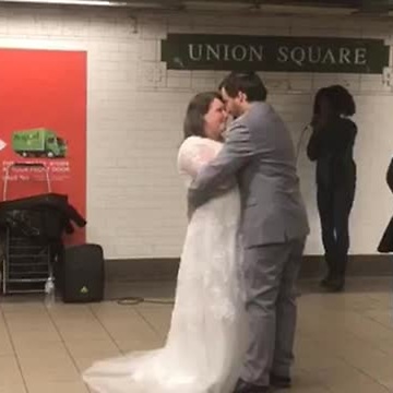 Married Couple Dances To A Capella Singing In Subway