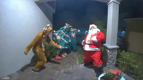 Dancing dads dress up in Christmas suits, bring joy to local kids