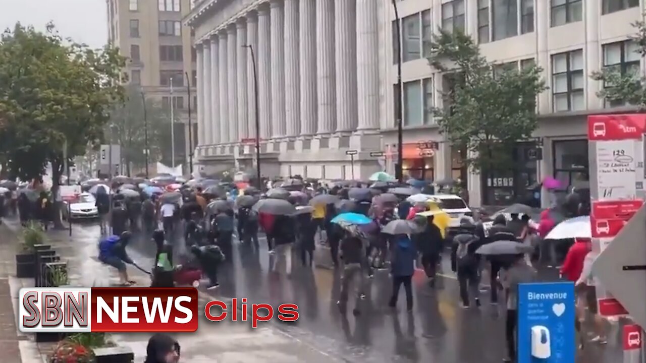 Despite the Rain, Thousands Hit the Streets of Montreal Against "Covid Passports" - 3856