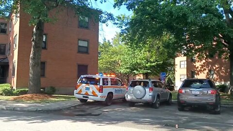 Boston fire and police respond to a small fire in the hallway of 71 Prentice Street