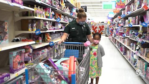 St. Lucie County Shop with a Cop event delivering holiday cheer