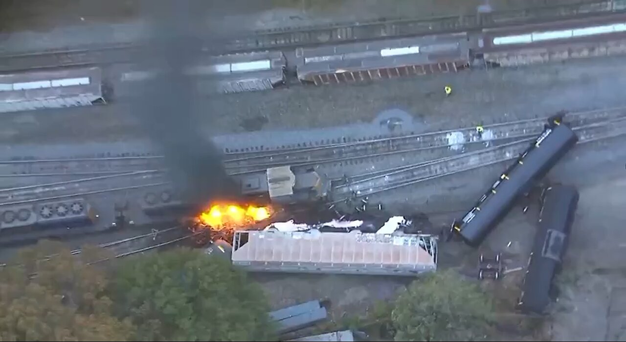 A train, reportedly transporting several thousand gallons of diesel fuel, has derailed causing fire