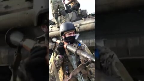Mariupol - soldier shows off captured RPG