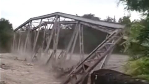 the bridge collapses in the river