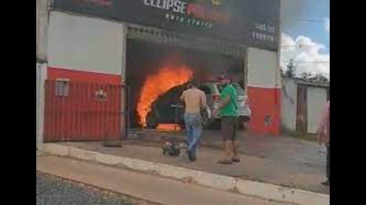 car catches fire in workshop