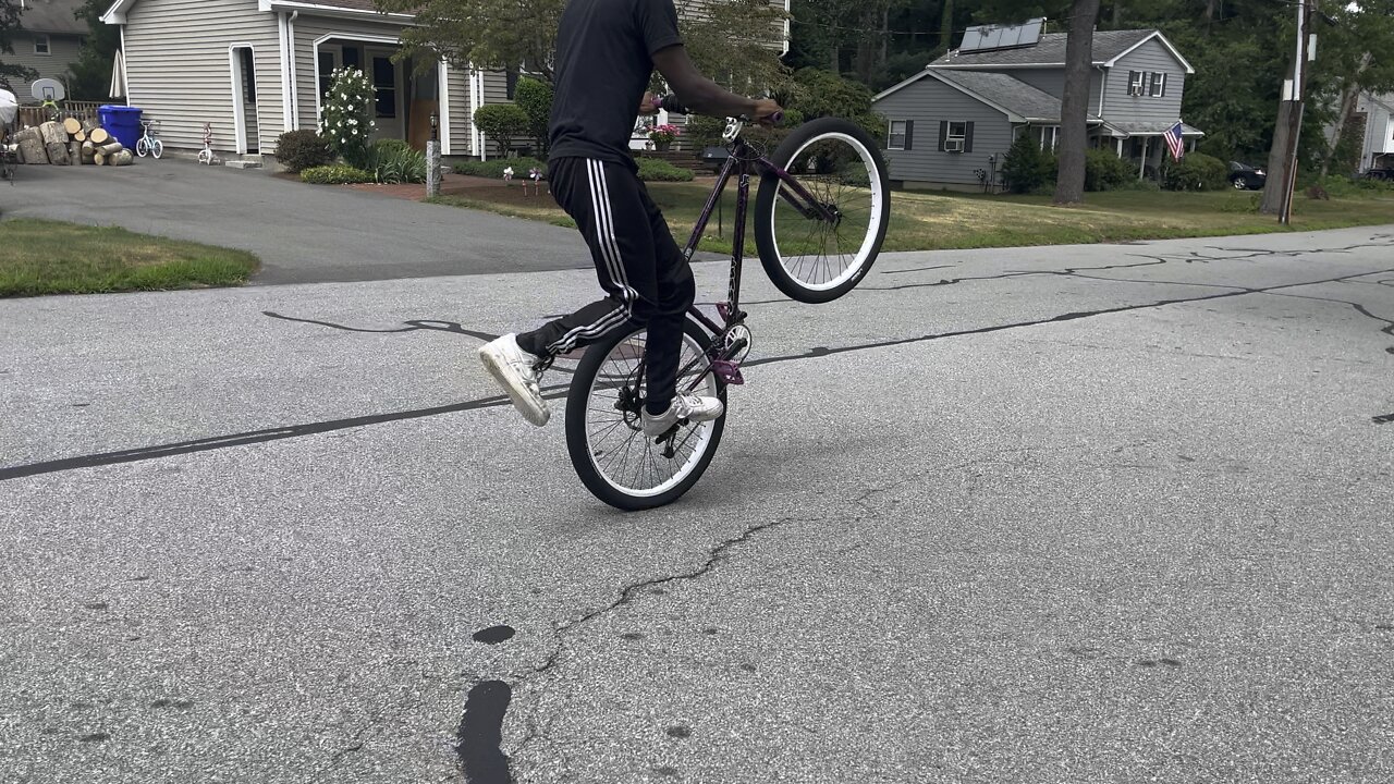 KID DOES SUPER TALENTED TRICKS ON BIKE