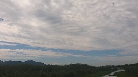 River. clouds and sky.