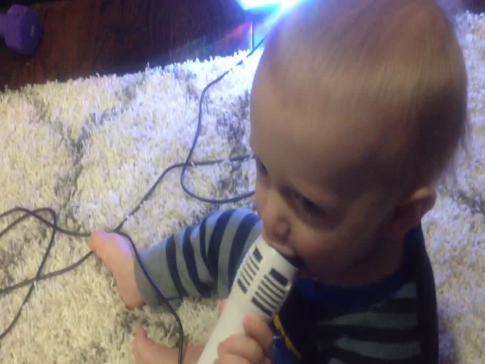 Baby's reaction to Microphone will have you Laughing!