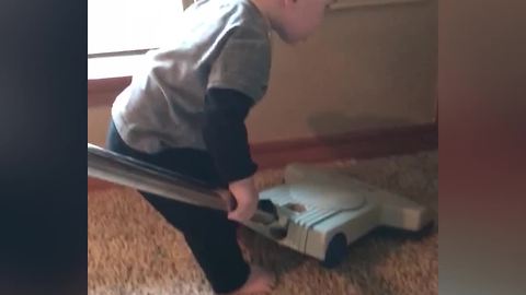 Tot Boy Loves To Vacuum