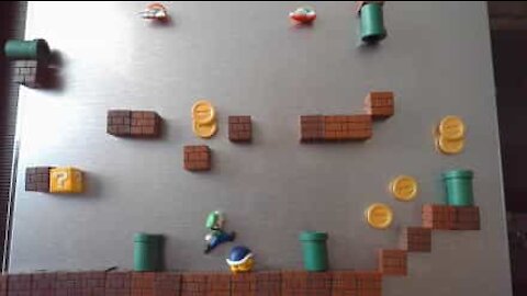 Super Mario game recreated using stop-motion of magnets on fridge