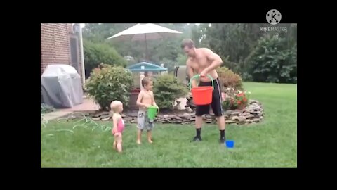 Funny baby playing with water