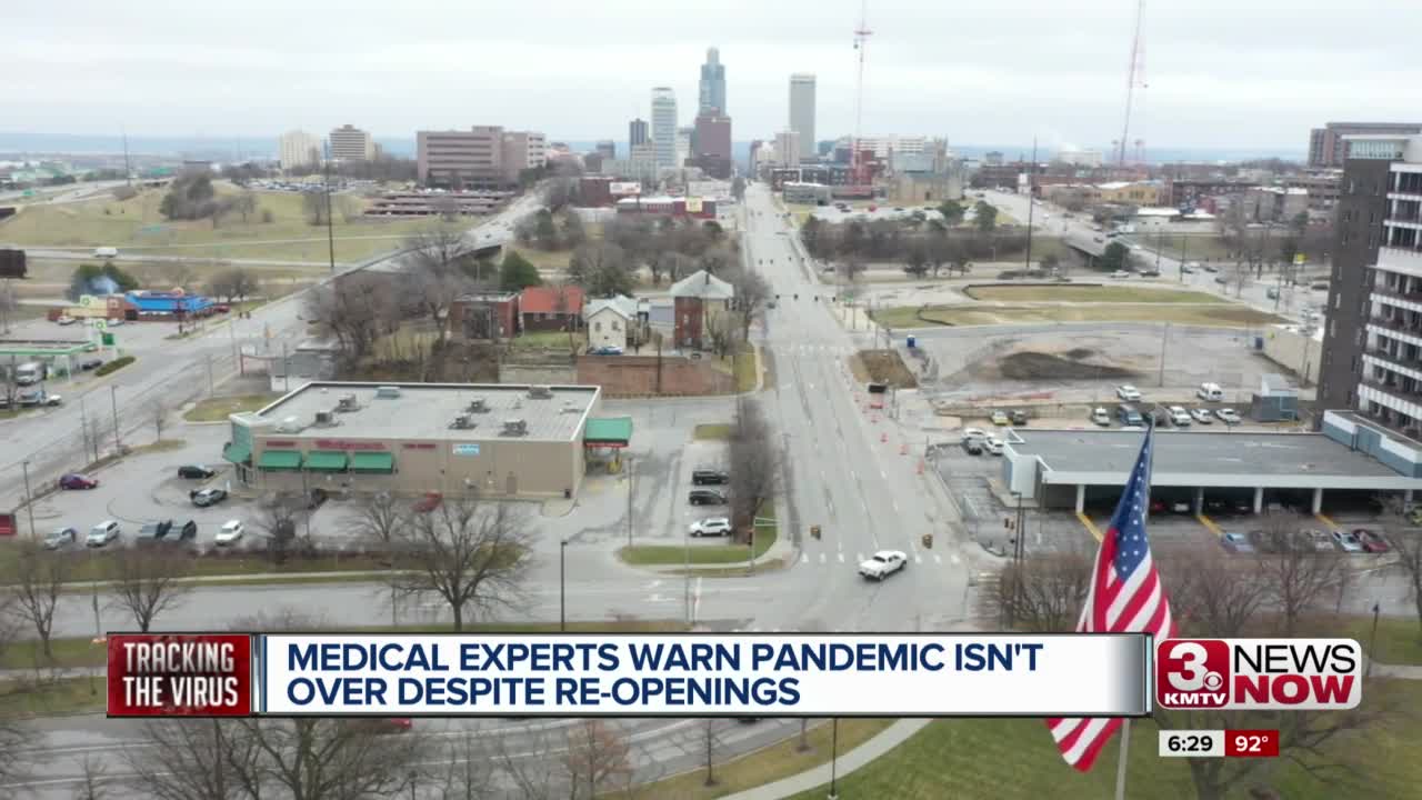 Medical experts warn pandemic isn't over despite re-openings