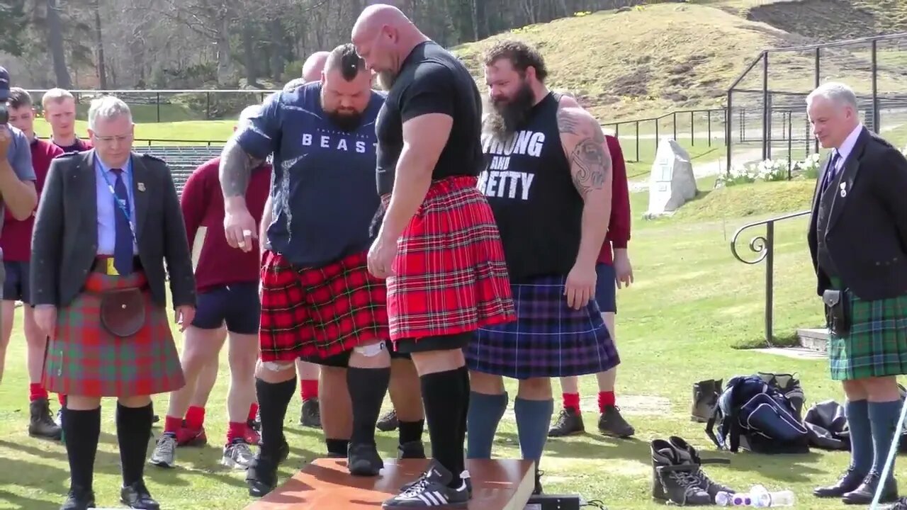 World's Strongest Men in a Tug o' War Challenge at Braemar Gathering Highland Games site in Scotland