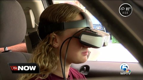 Palm Beach Atlantic University try high-tech simulator, learn about dangers of texting and driving