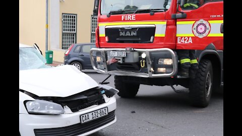 A Fire truck and a Police vehicle collided