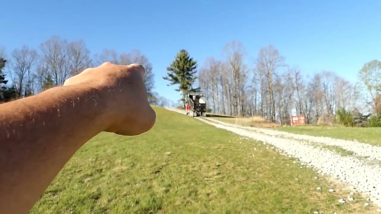 Spreading gravel in the upper meadow.