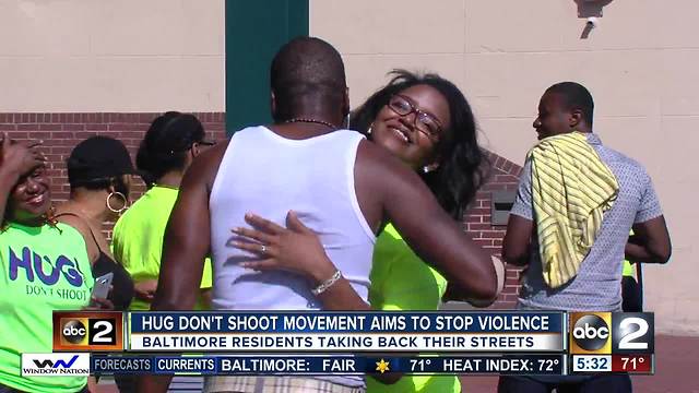 Hug don't shoot movement aims to stop violence in Baltimore