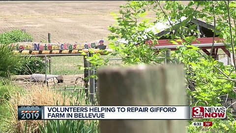 Volunteers helping Gifford Farm clean up from flooding