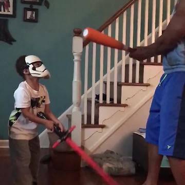 "Dad and Son's Duel Ends in Pain"