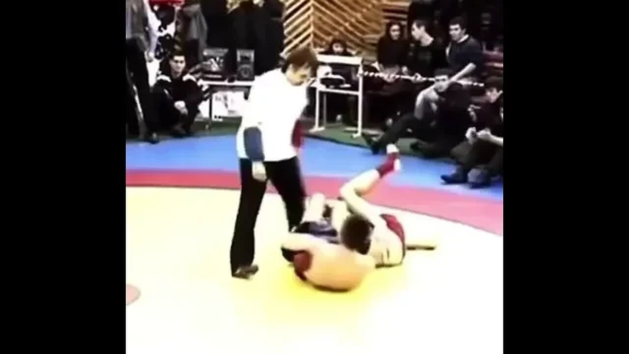 khabib performing a flying armbar.