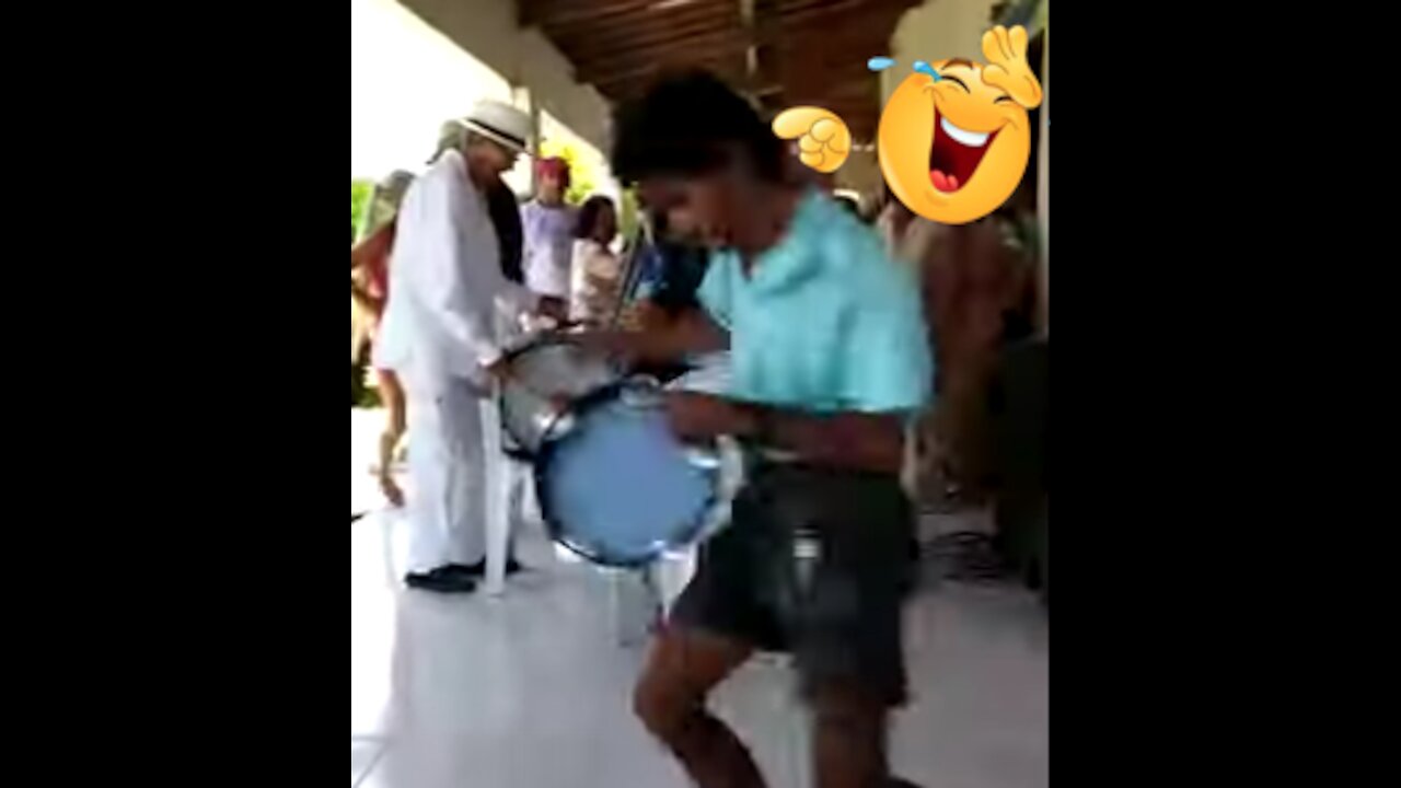 Skinny man dancing very crazy with the tambourine in his hand - Try not to laugh