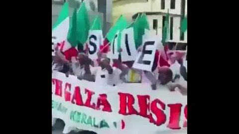 India holding their "FREE PALESTIEN" demo, complete with Italian flags