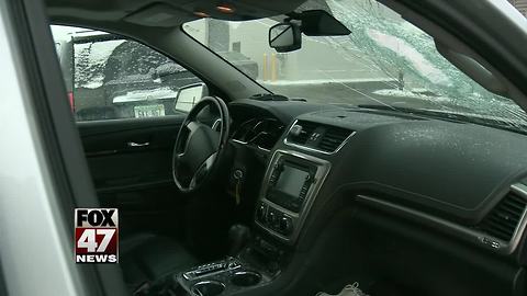 Concrete lands on car on Michigan freeway