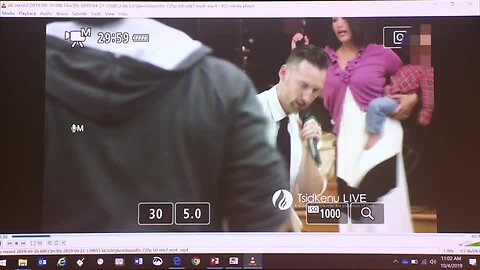 Surveillance video shows woman with gun and baby