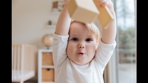 Cute baby, a mother carring baby.