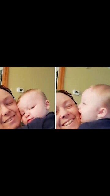Little Baby gets a kiss from your mom, and in return kisses her face back