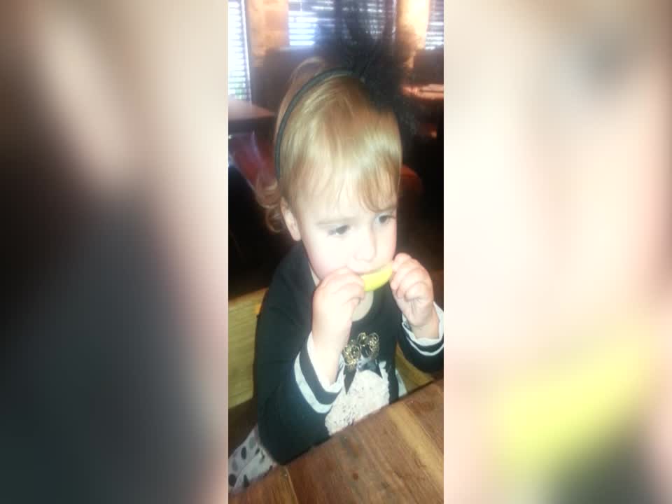 This Girl Trying a Lemon for the First Time is So Cute