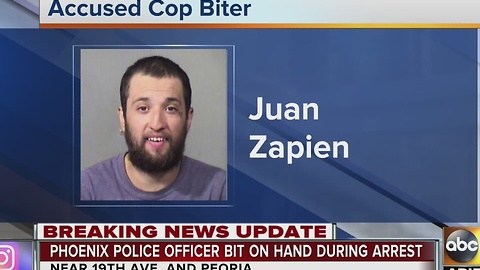 Man who tried to bite officer slapped with handcuffs