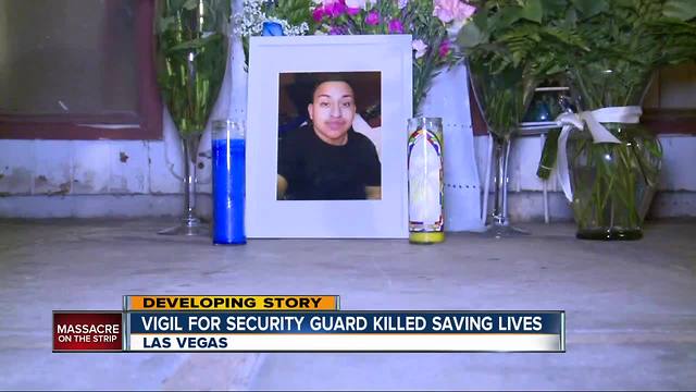 Vigil for security guard killed saving lives