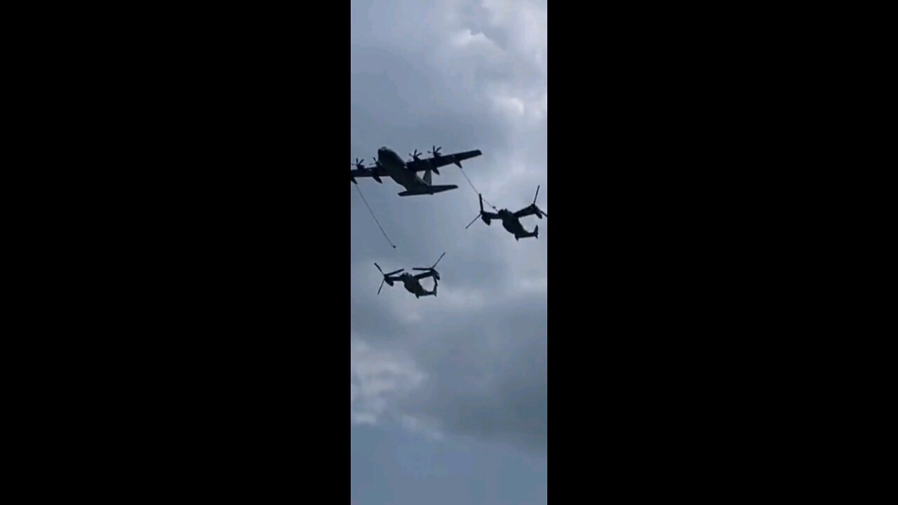 A pair of V22 Osprey refueling