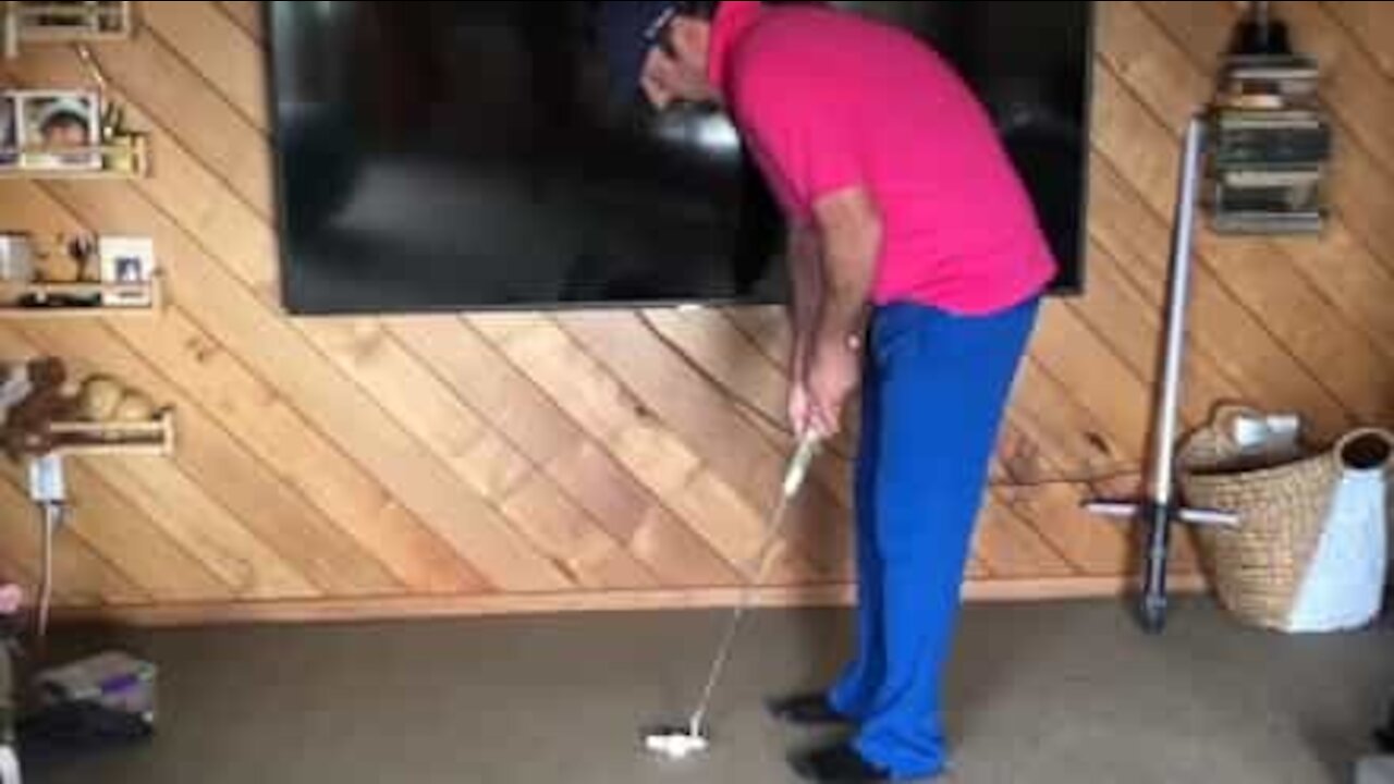 Man pulls amazing mini golf trick shots at home