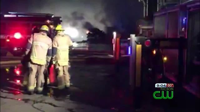 Crews battling fire with burning cars and scraps at metal recycling yard