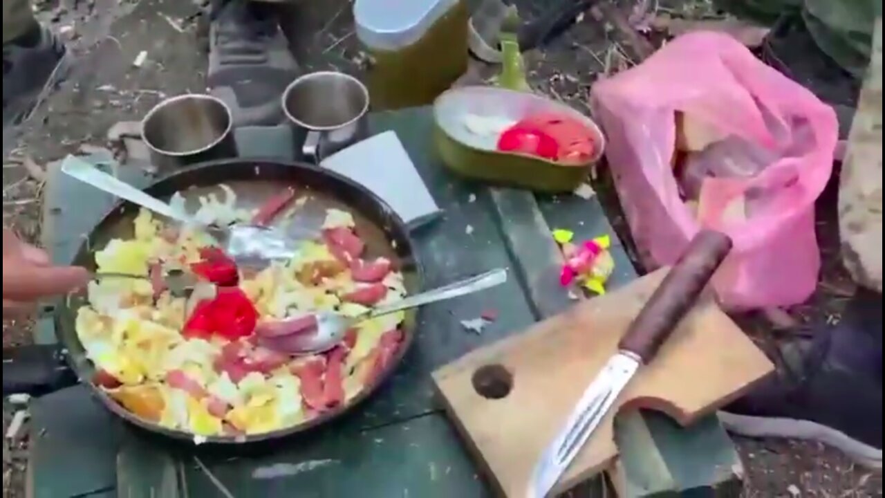 Yakut artillerymen do some work then have lunch