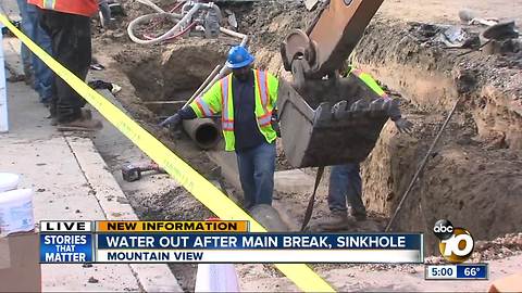 Water main break floods homes