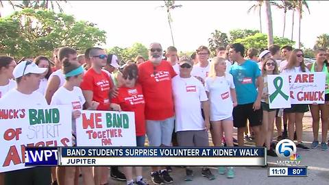 Students give band volunteer a nice surprise at kidney walk