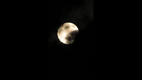 Waxing Gibbous 98.8% in the Black of Clouds