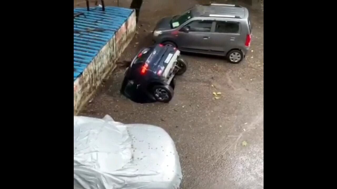 Car falls after rain