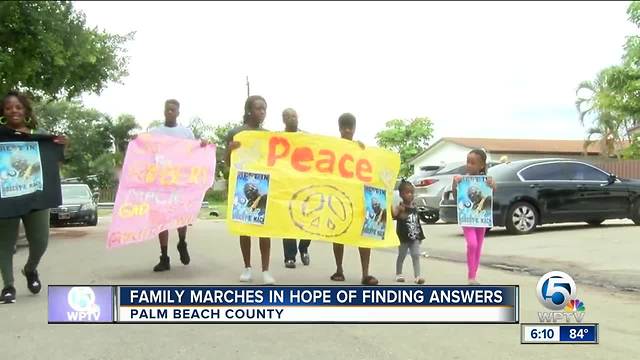 Family marches in hopes of finding answers