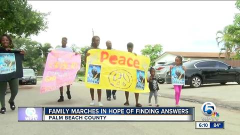 Family marches in hopes of finding answers
