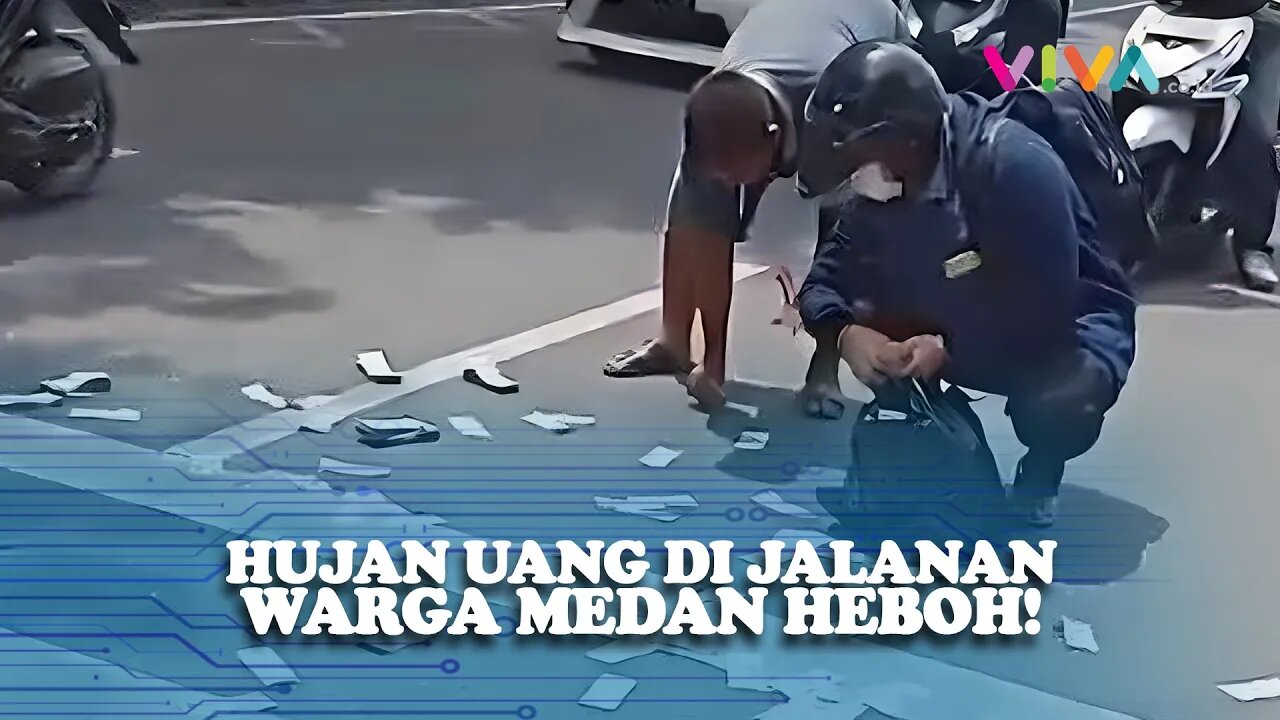 Bikin Melongo, Uang Berserakan di Jalanan Kota Medan