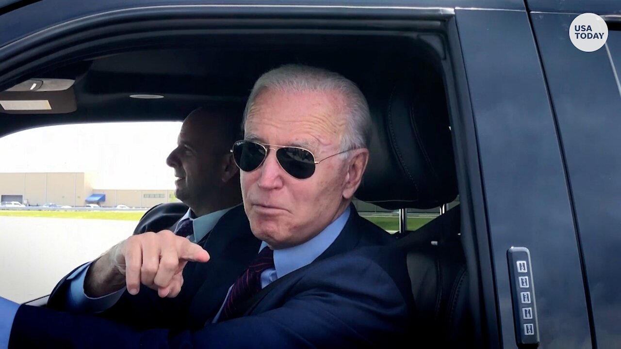 President Biden speed away in Ford's new electric F150 Lightning