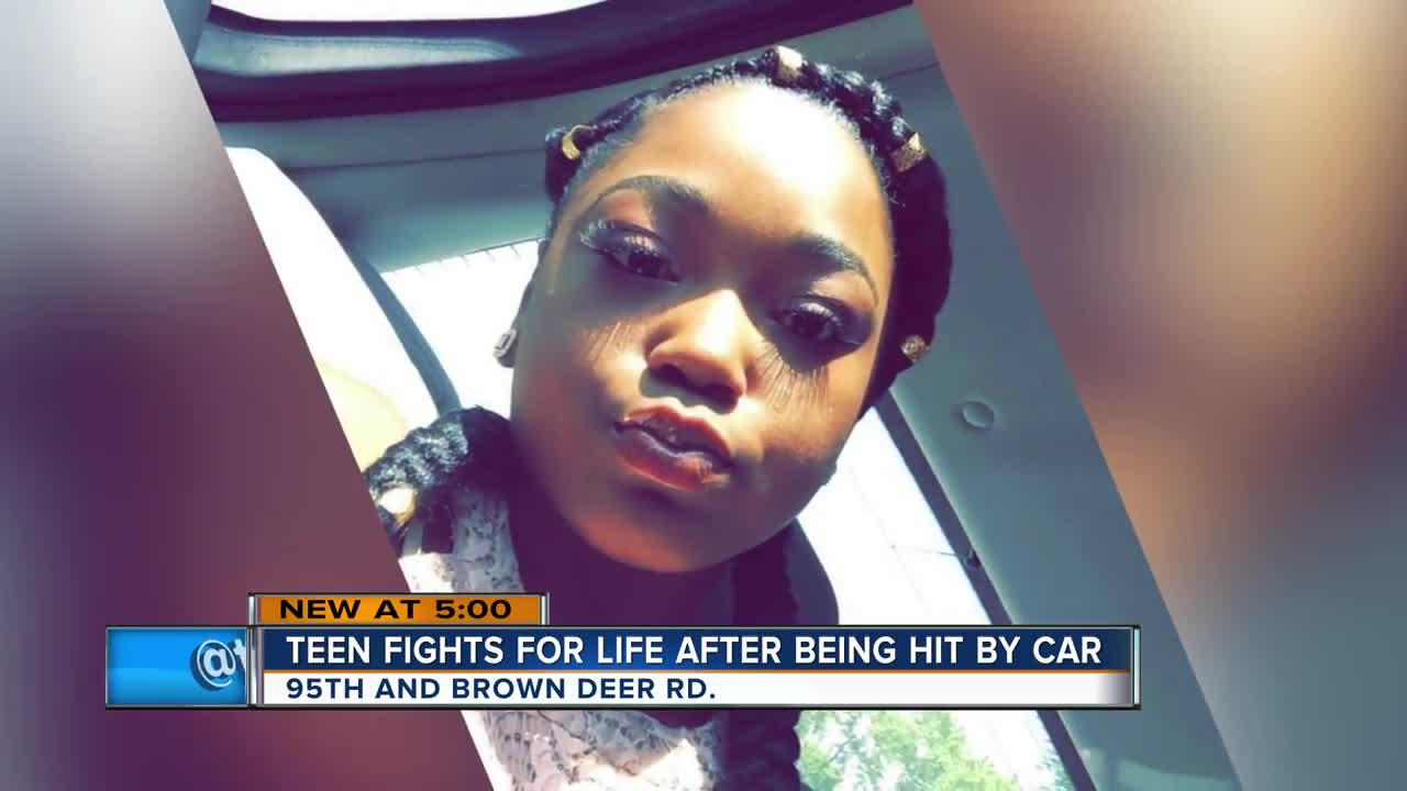Teenager fights for her life after being hit by a car in Milwaukee